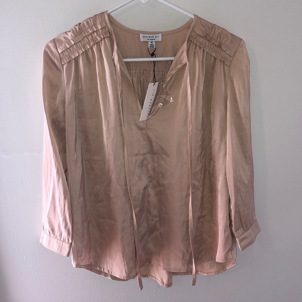 Nude colored blouse